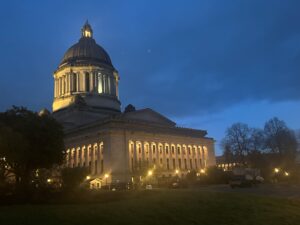 Photo of the Capitol Building in Olympia, Washington, shot from the side, in the early morning before the sunrise from March 2025.